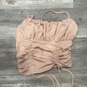 pink tank top cinched in the back ; dressy occasions